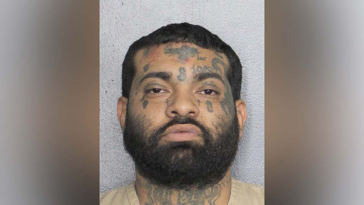 Jeffry-Arista tattoos on face mugshot