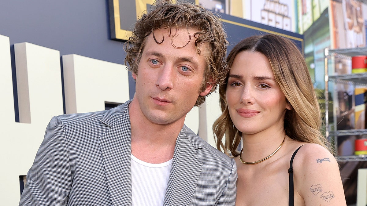 Jeremy Allen White and Addison Timlin at a premiere