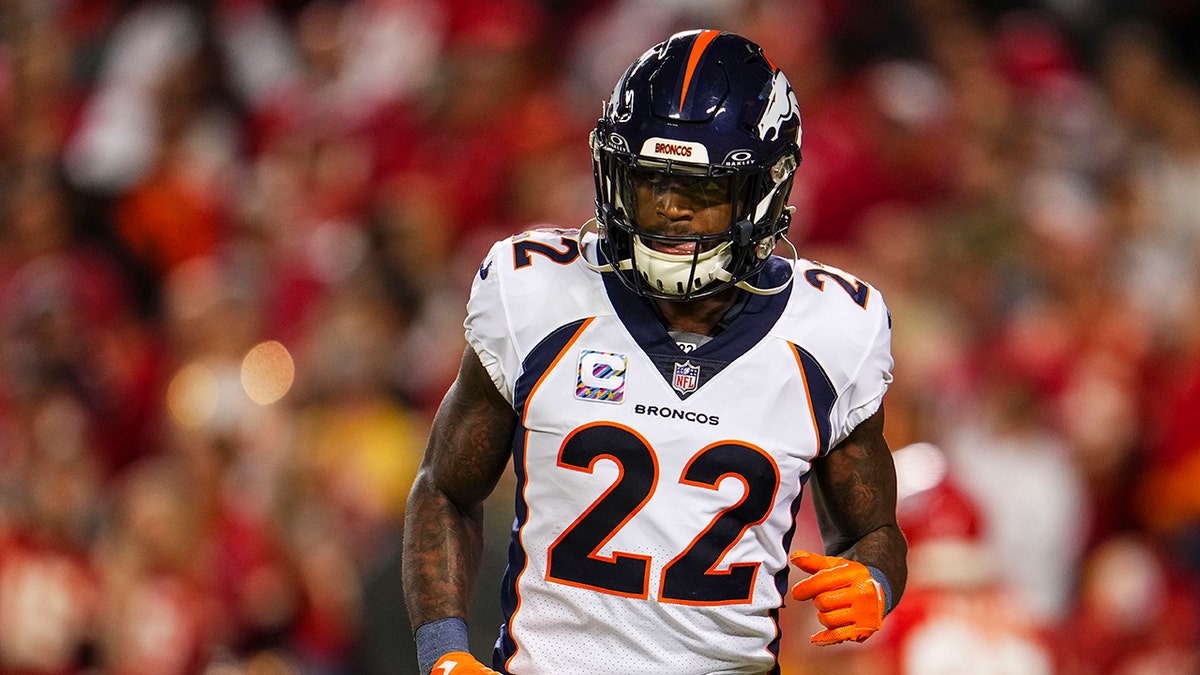 Denver Broncos safety Kareem Jackson runs on field