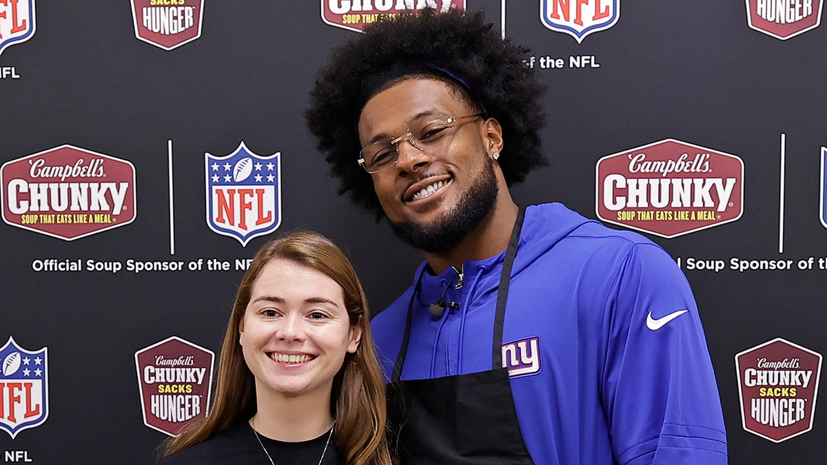 Kayvon Thibodeaux smiles at event