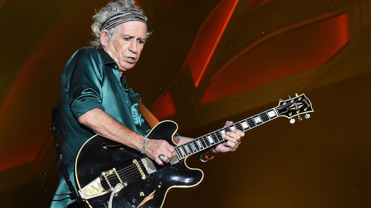 Keith Richards playing guitar