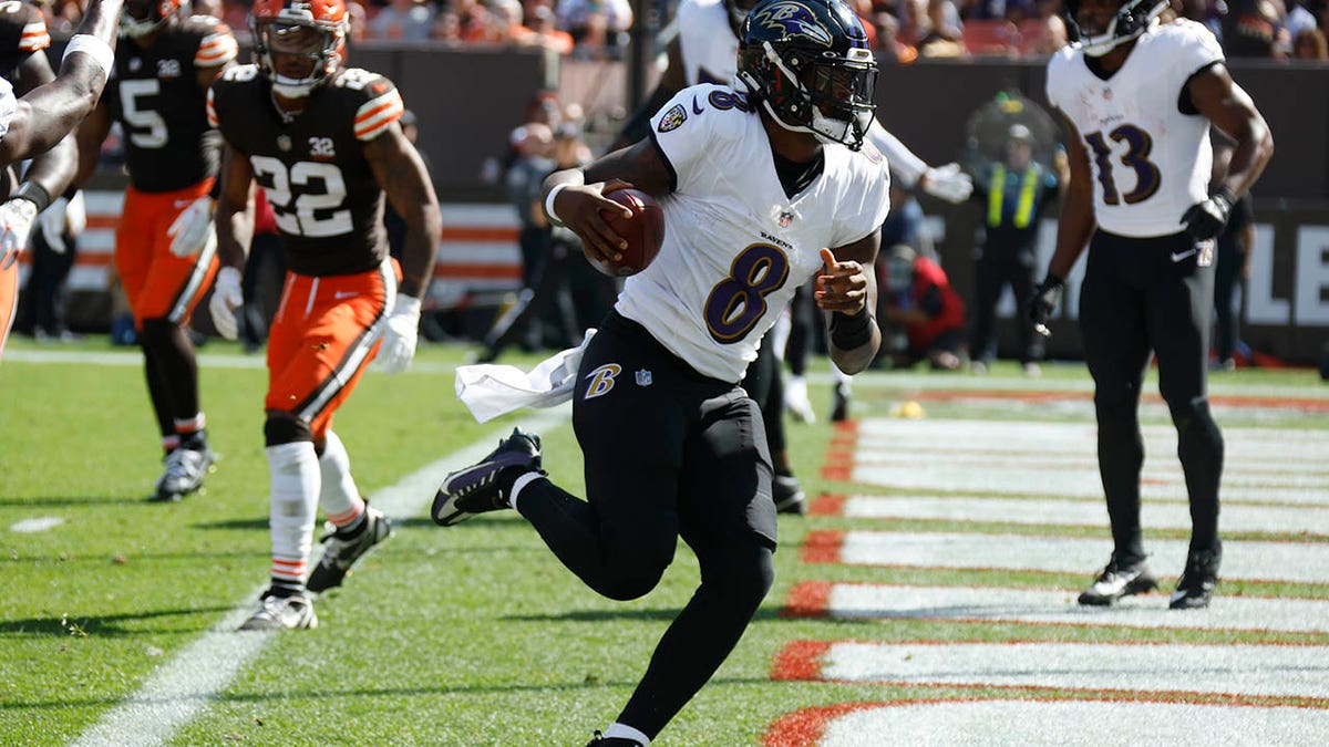 Lamar Jackson runs