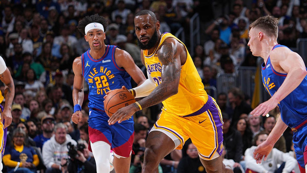 LeBron James dribbles during an NBA game