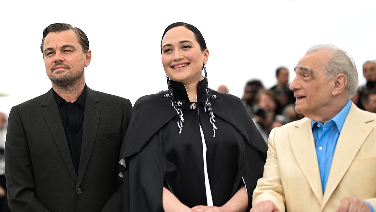 Leonardo DiCaprio, Lily Gladstone and Martin Scorsese pose together