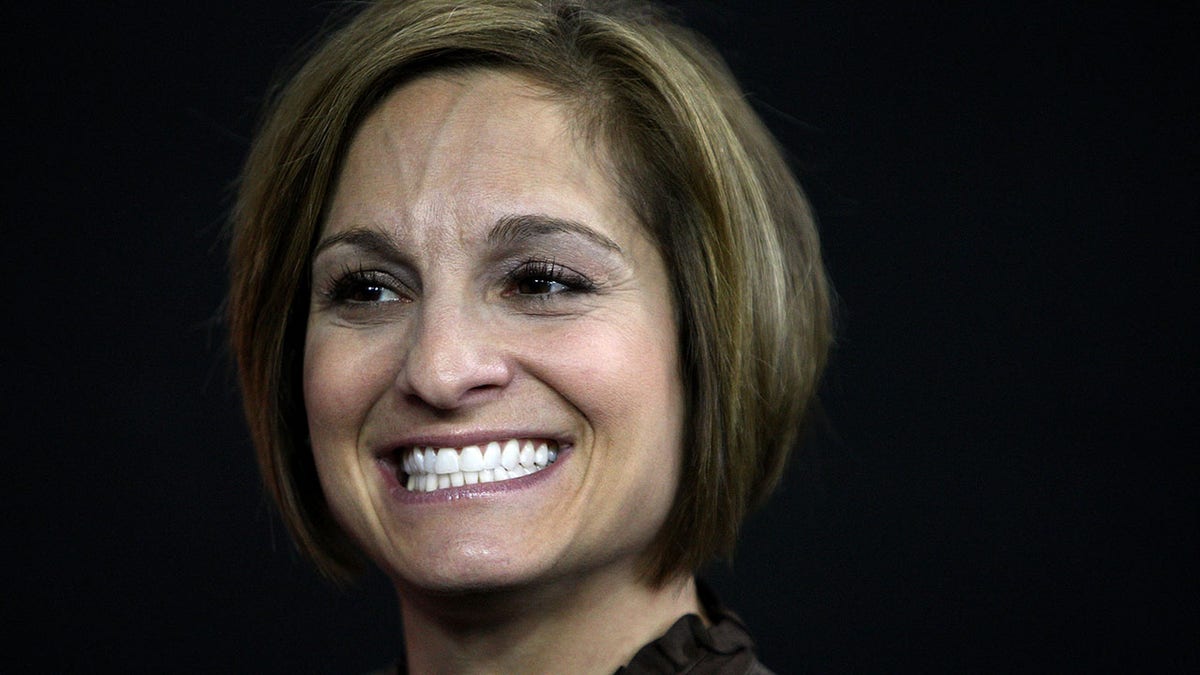 Mary Lou Retton looks on during a competition