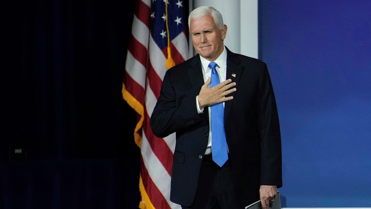 Mike Pence holding hand over heart
