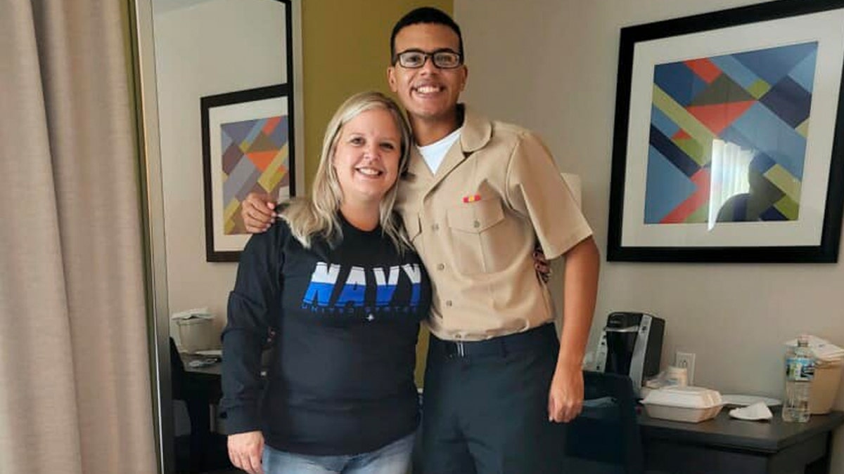 Missing Nija Townsend in uniform smiling with mom