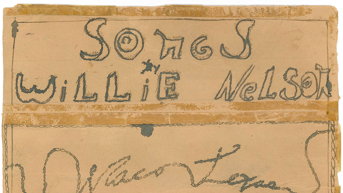 un biglietto scritto a mano con sopra il nome di Willie Nelson