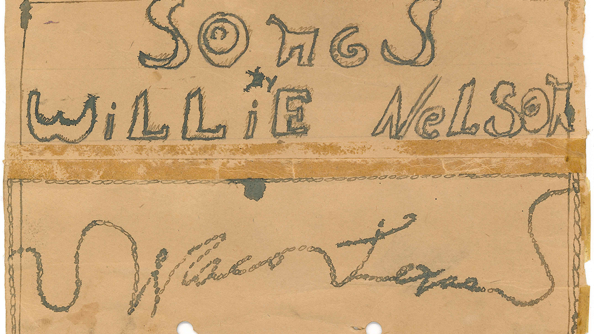 un biglietto scritto a mano con sopra il nome di Willie Nelson