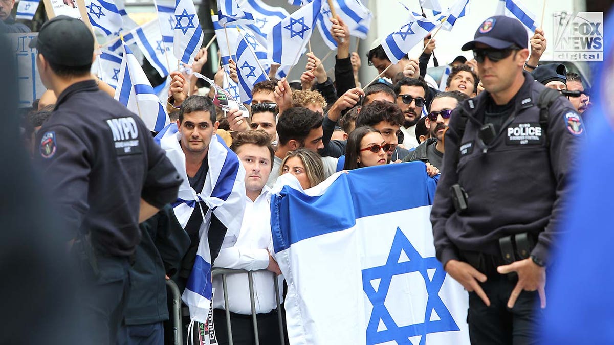 Demonstrators attend an 