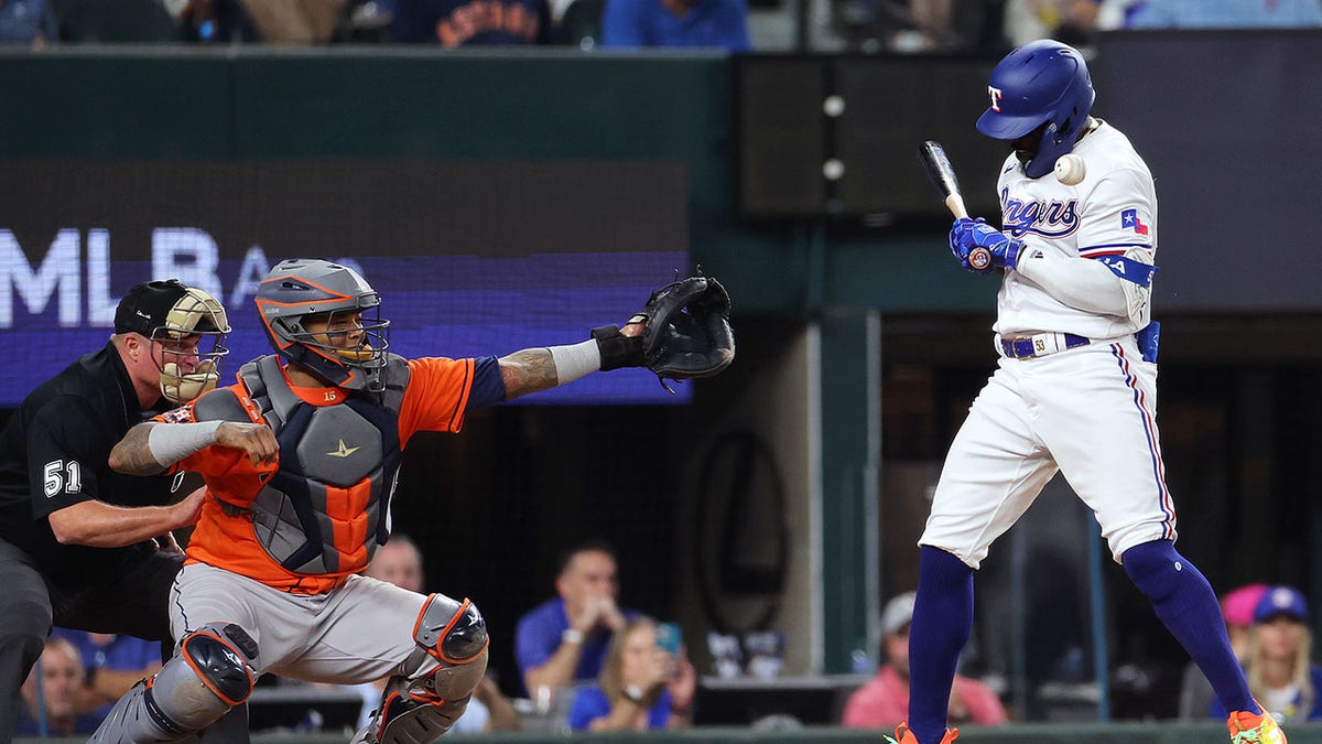 Texas Rangers player hit by a pitch