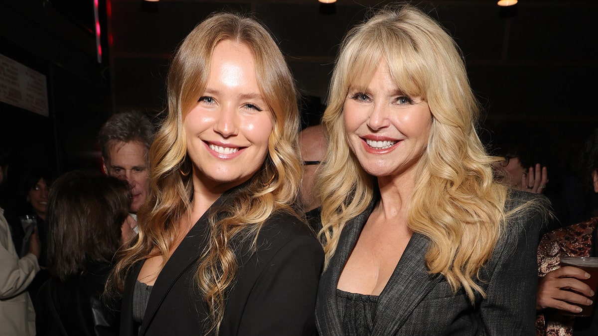 Sailor Brinkley Cook and her mom at a concert