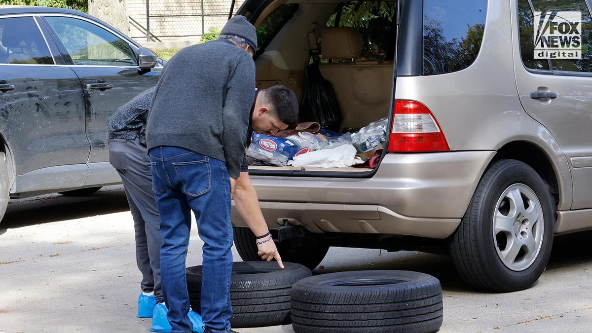 Samantha Woll's neighbor's tires are being inspected by police