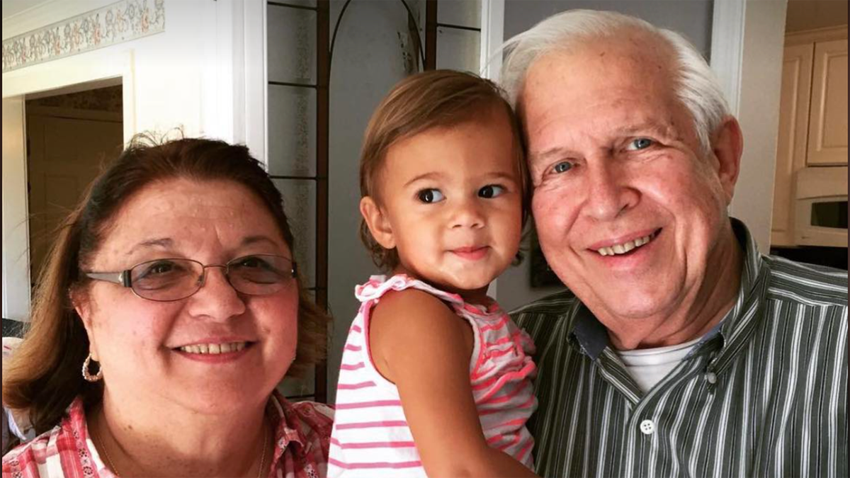 grandparents and granddaughter