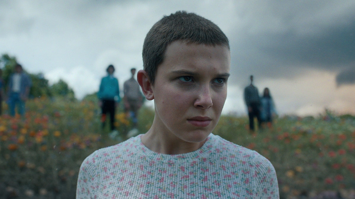 Close up of Millie Bobby Brown in character as Eleven on Stranger Things
