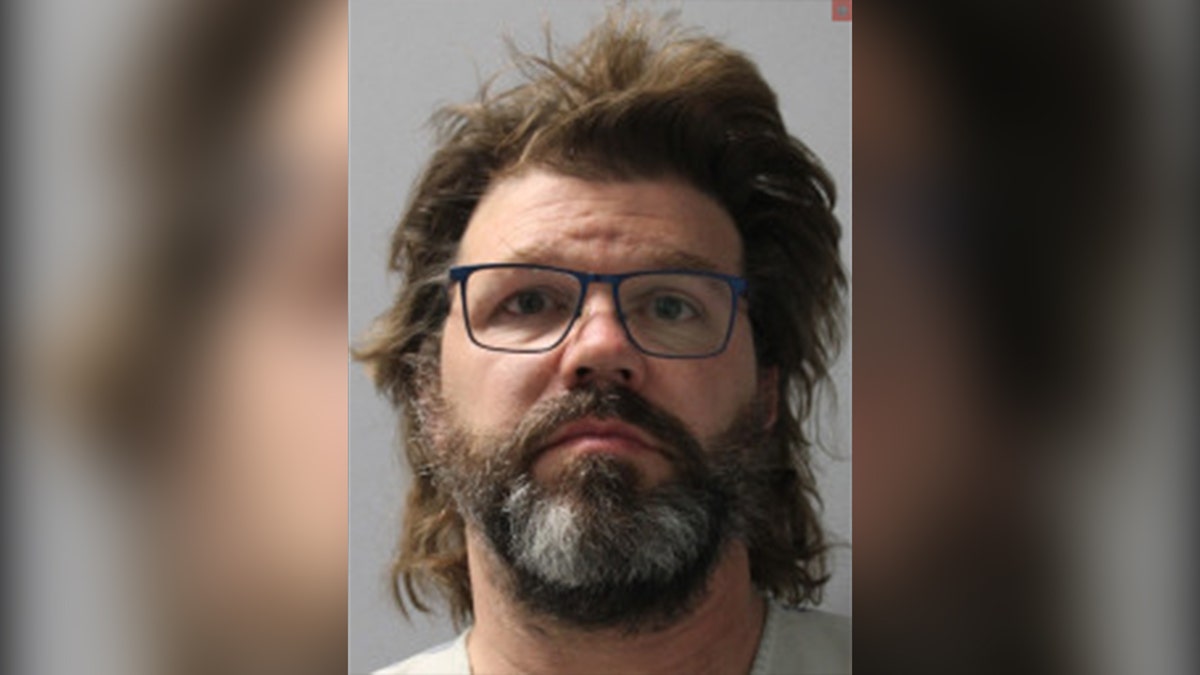 Paul Stromberg, 52, was charged with illegal destruction of wildlife after authorities discovered the bodies of a mother black bear and her cubs near his home.