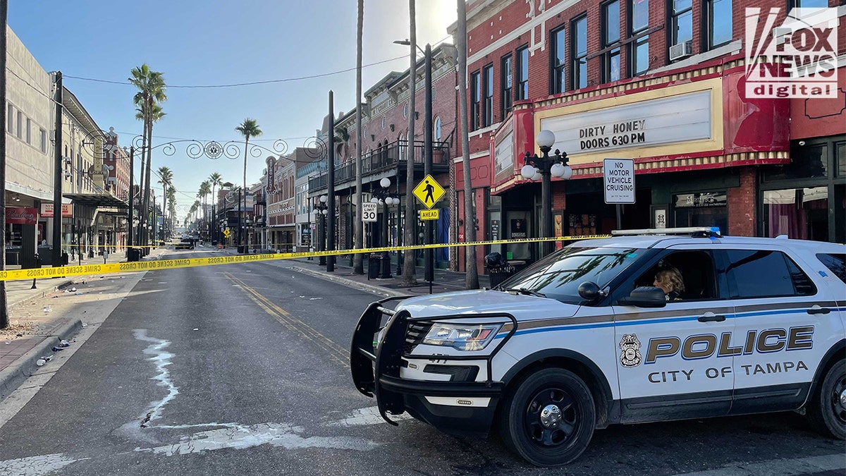 police car in taped off area