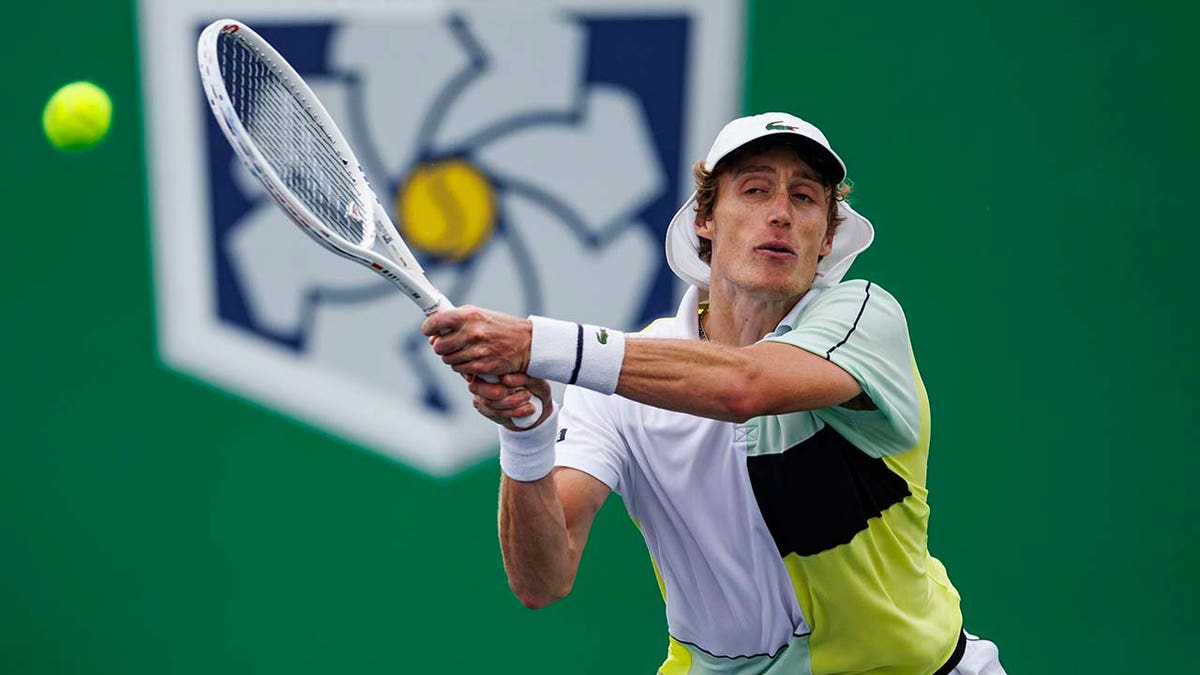 Marc Polmans plays a tennis match in China