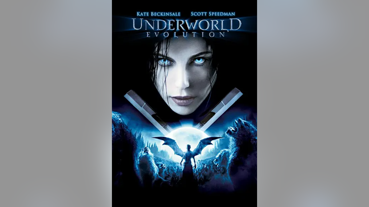 "Underworld Evolution" movie poster with woman with blue eyes