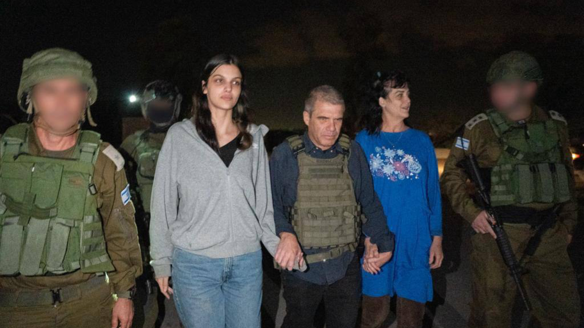 Brigadier General Gal Hirsch is pictured with released hostages Judith and Natalie Raanan.