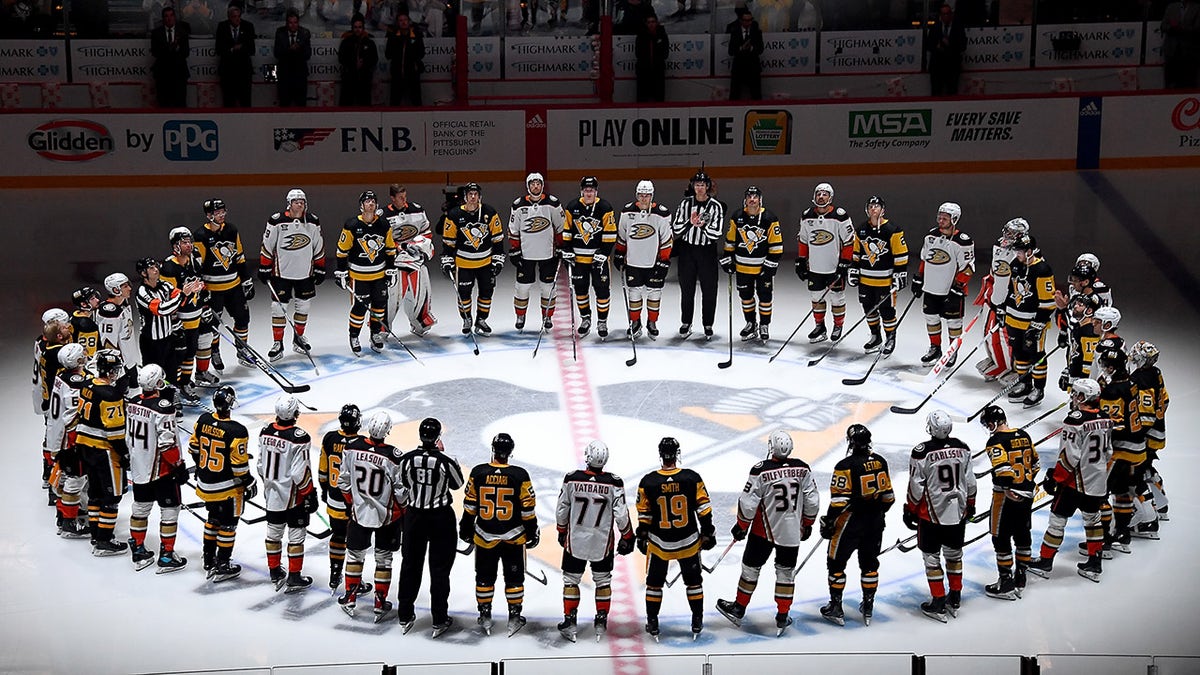 Players honor Adam Johnson