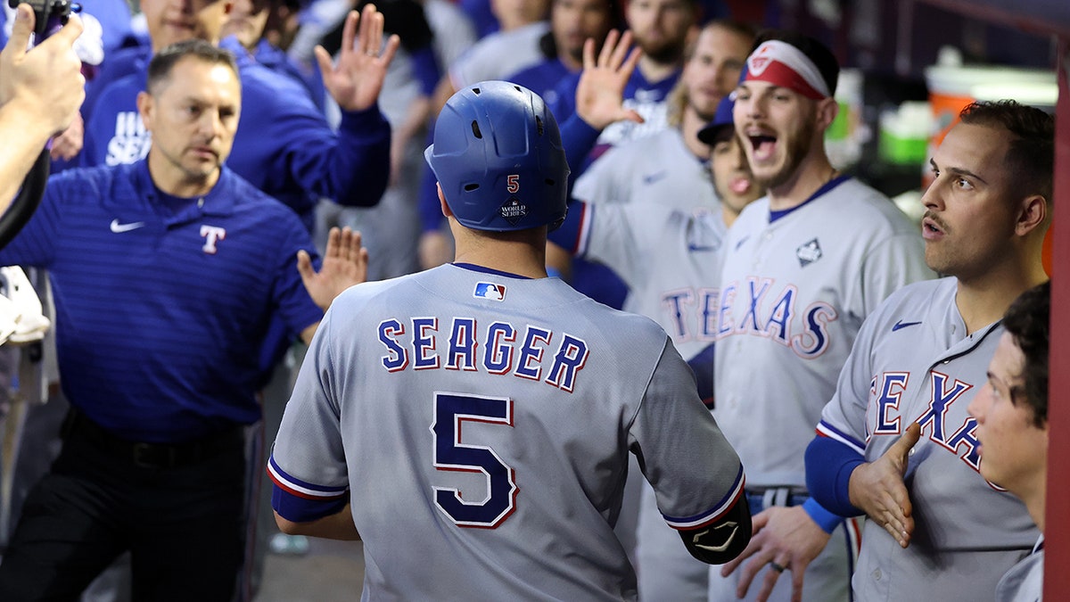Rangers dugout after Seager home rung
