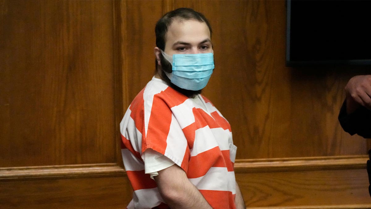 Ahmad Al Aliwi Alissa, accused of killing 10 people at a Colorado supermarket in 2021, is led into a courtroom on Sept. 7, 2021, in Boulder.