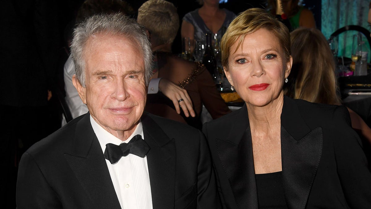 Warren Beatty wears tux with wife Annette Benning in a suit at awards show