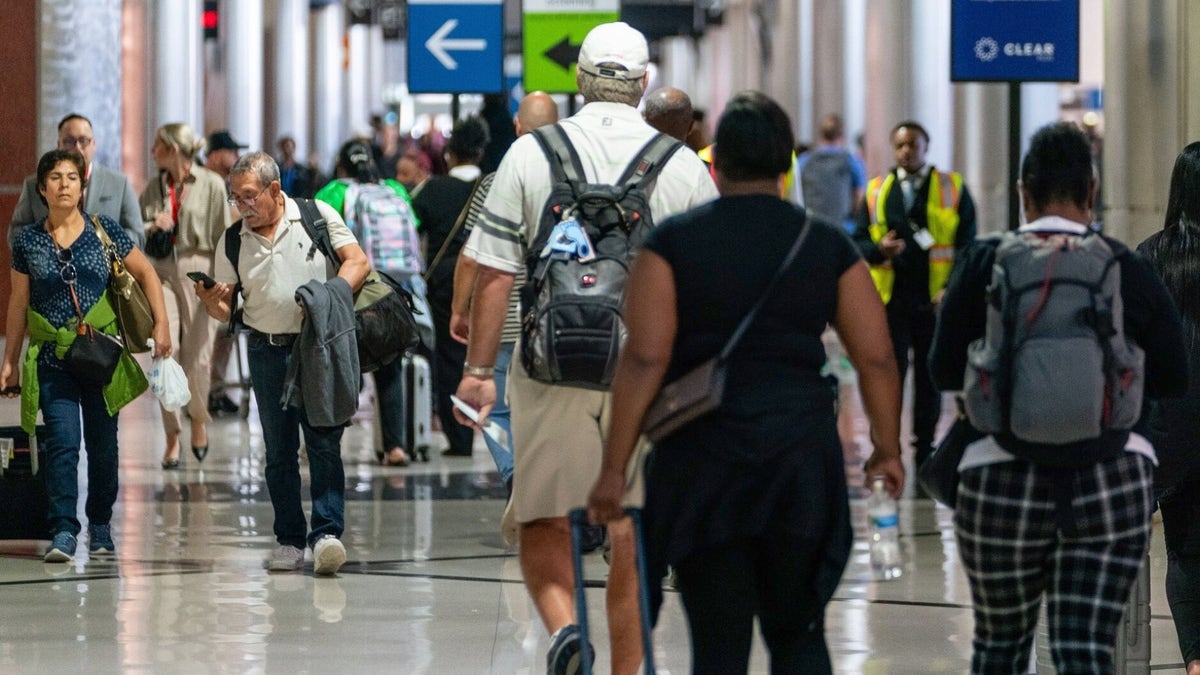 Travelers walking in Atlanta airport