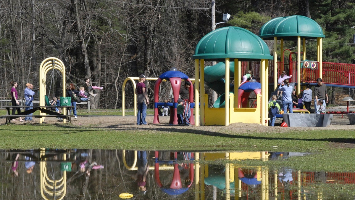 2 juveniles charged with dumping acid on playground slides in southern Massachusetts Bliss Park