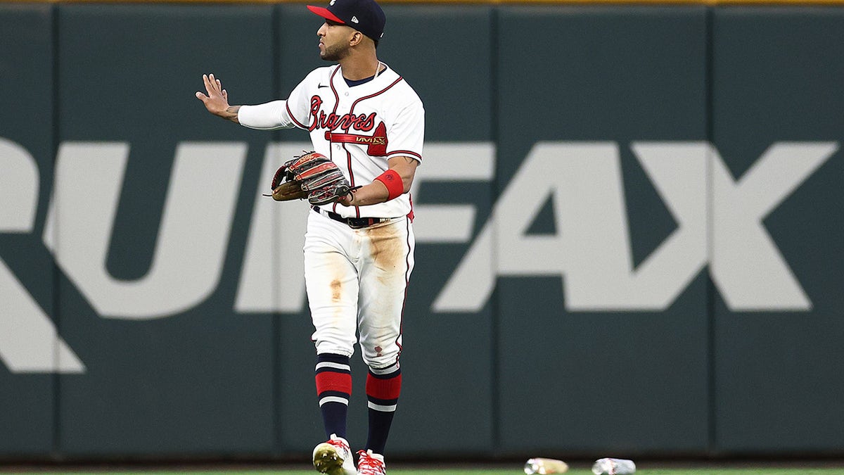 Braves Fans Throw Bottles On Field After Controversial Call | Fox News