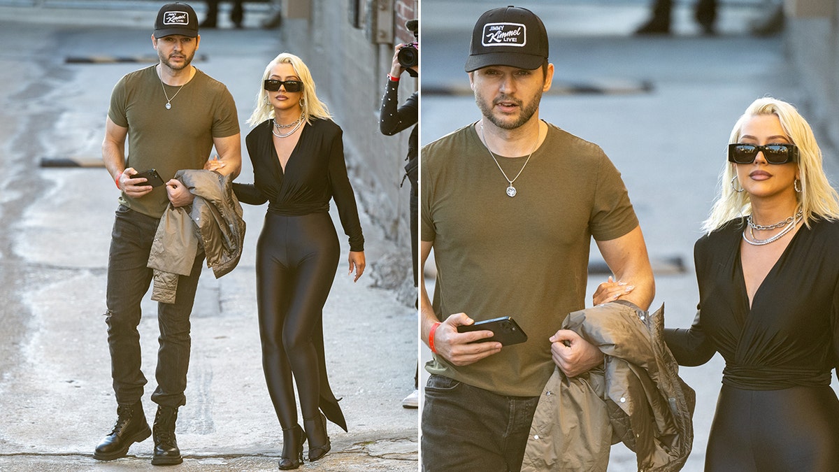 Christina Aguilera and her boyfriend walking outside