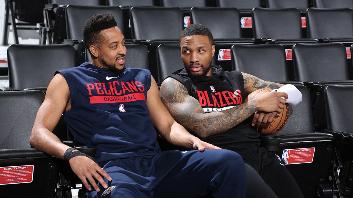 CJ McCollum and Damian Lillard before game