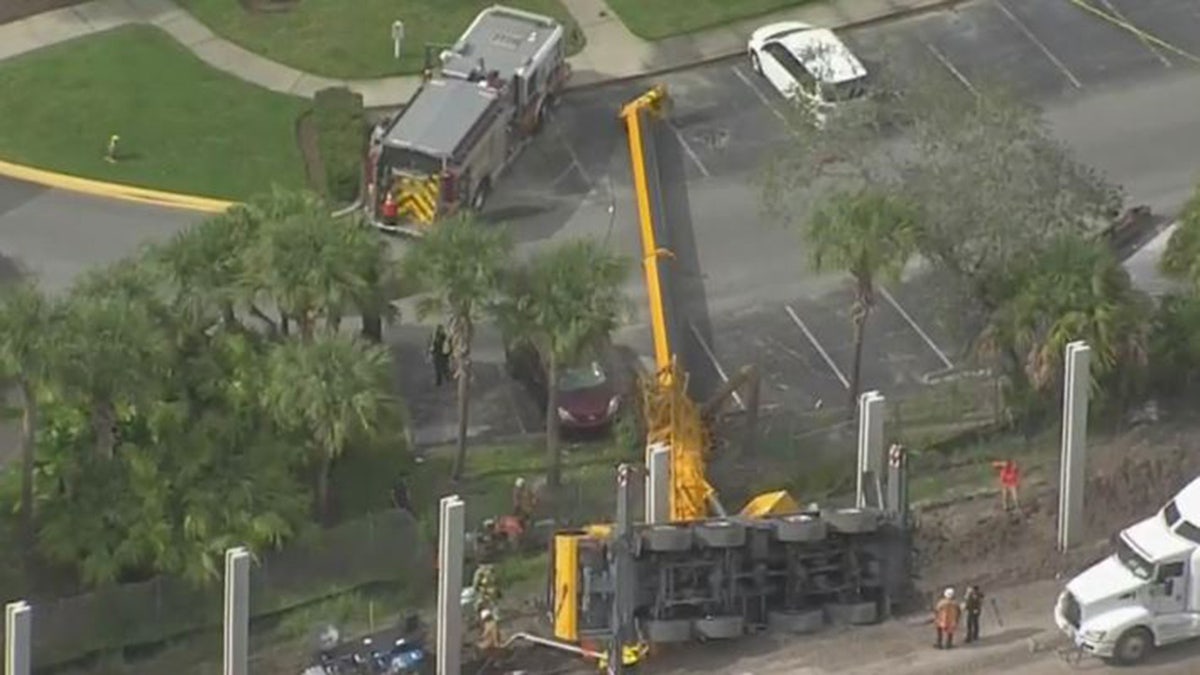 toppled over crane