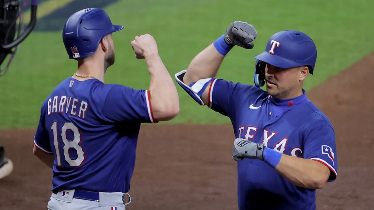 Nathaniel Lowe celebrates home run