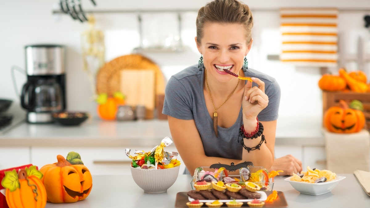 Woman eating candy