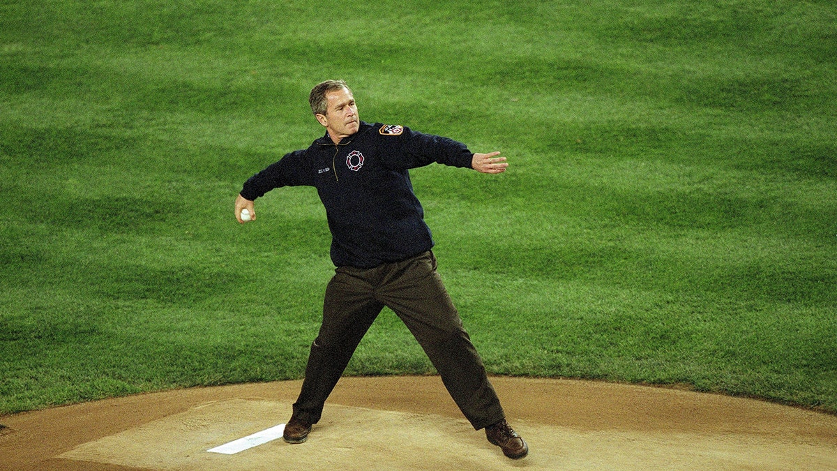 George W. Bush throws a first pitch