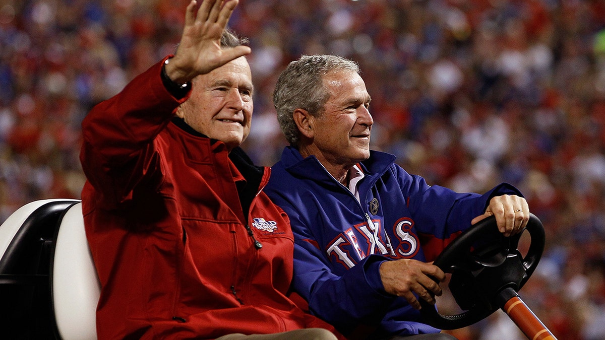 George W. Bush, and his father at the World Series