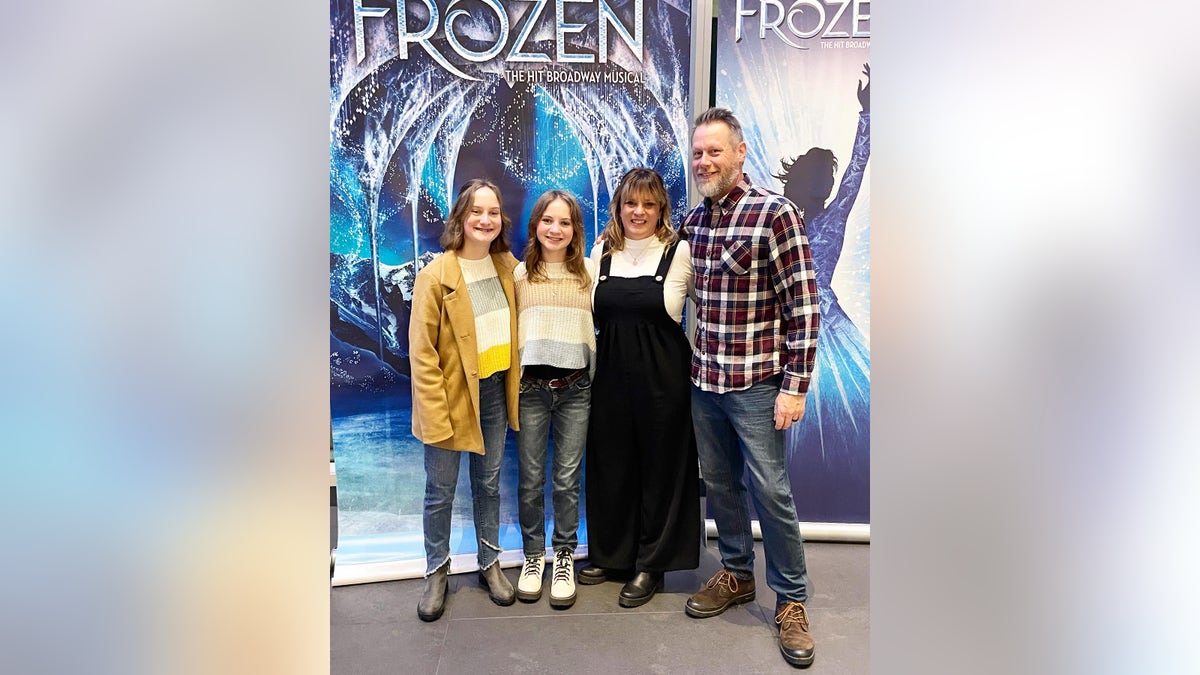 Grace Overman with her family at Frozen