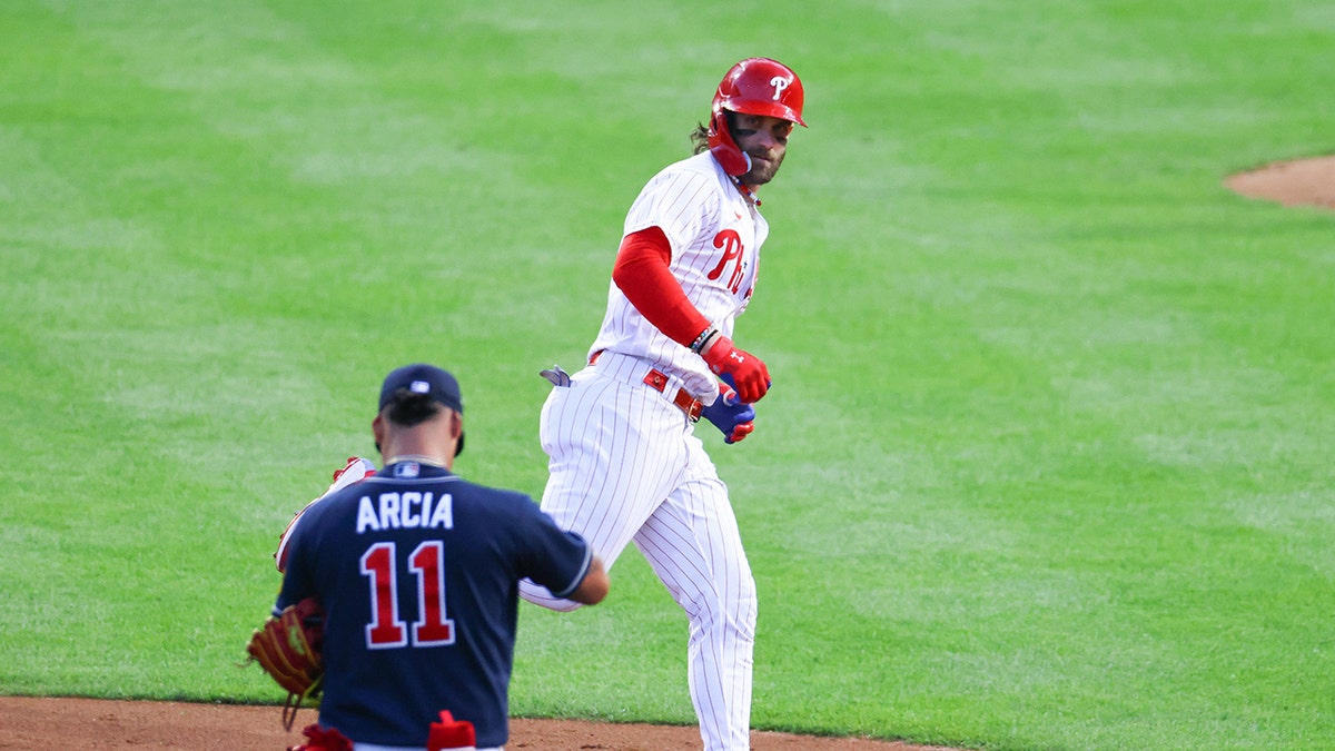 Bryce Harper staring at Orlando Arcia