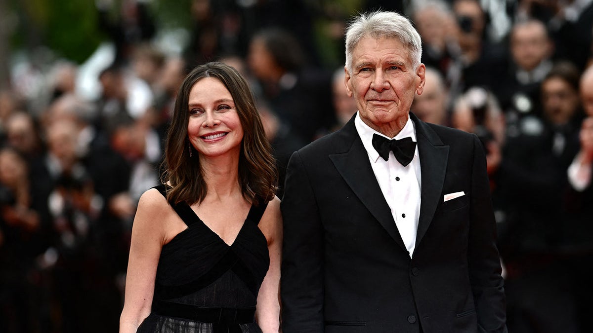 Harrison Ford and Calista Flockhart walk Cannes Film Festival red carpet in France