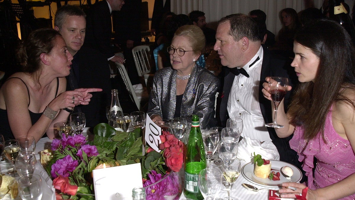 Harvey Weinstein wears tuxedo next to Julia Ormond at Cannes in France