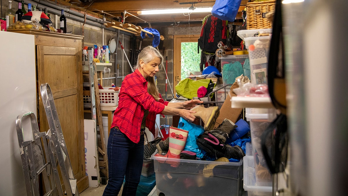 woman decluttering mess