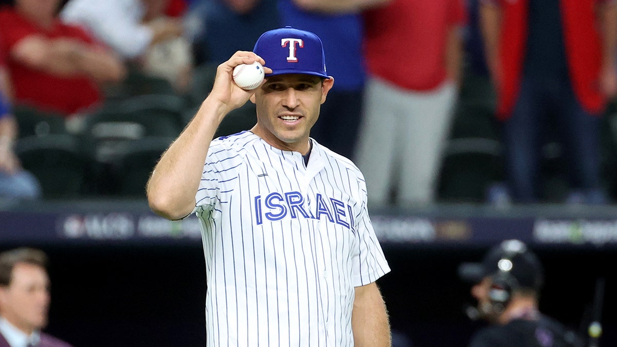 Texas Rangers legend Ian Kinsler wears Team Israel jersey during