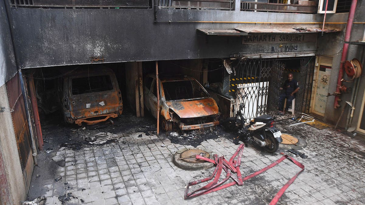 scorched building and cars