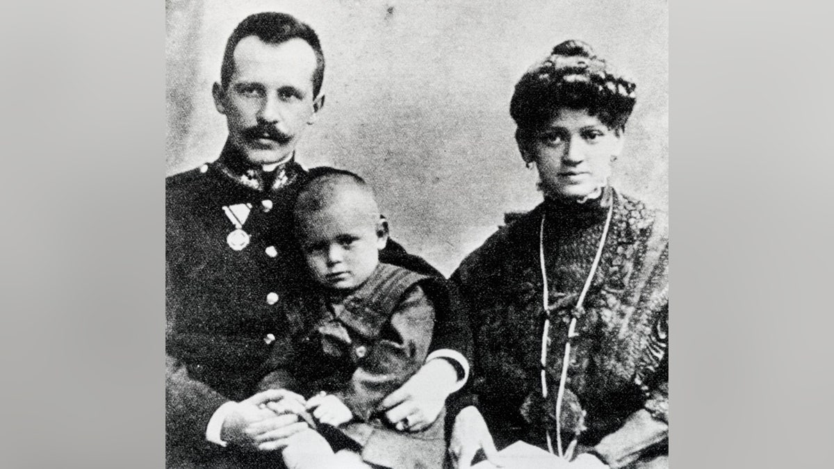Young boy with his parents