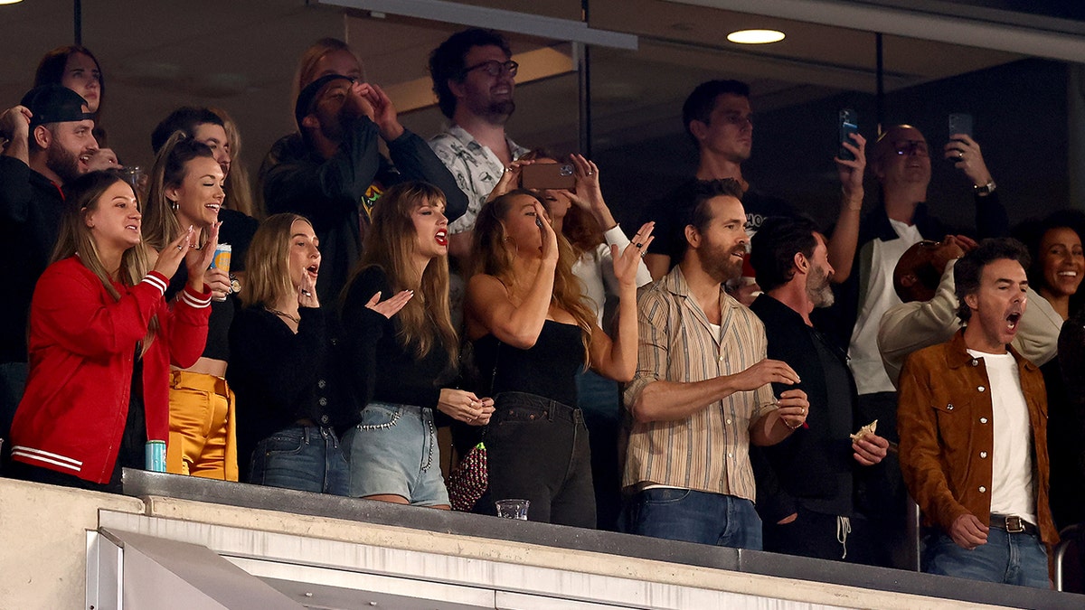 Blake Lively rocks black tube top at Kansas City Chiefs game with Taylor Swift and Ryan Reynolds
