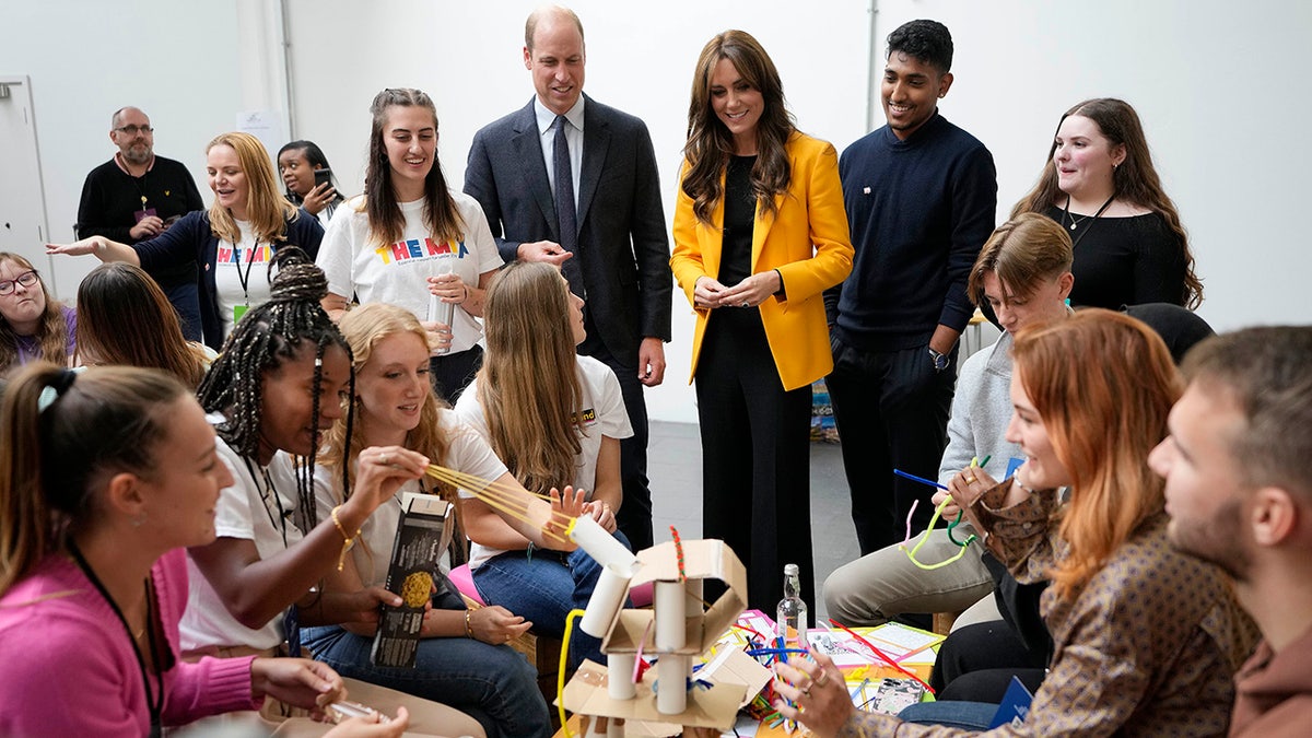 William and Kate speaking to a group of young people