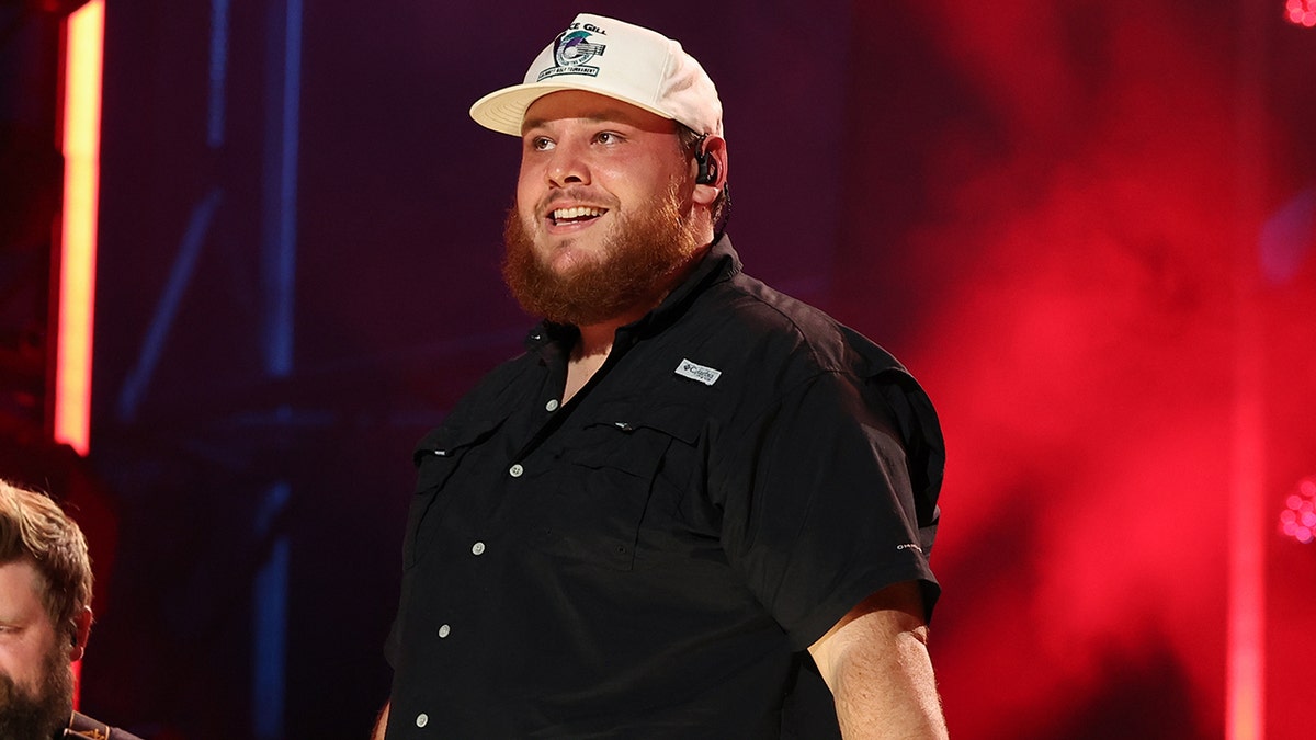 Luke Combs performing at CMA Fest 2023