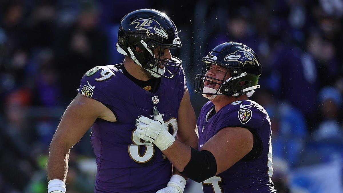 Mark Andrews, #89 of the Baltimore Ravens, celebrates with Tyler Linderbaum, #64, after scoring a touchdown in the third quarter of the game against the Detroit Lions at M&amp;T Bank Stadium on Oct. 22, 2023 in Baltimore.